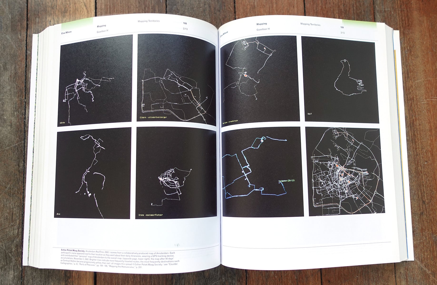 Open book with a grid of nine GPS route maps from the project